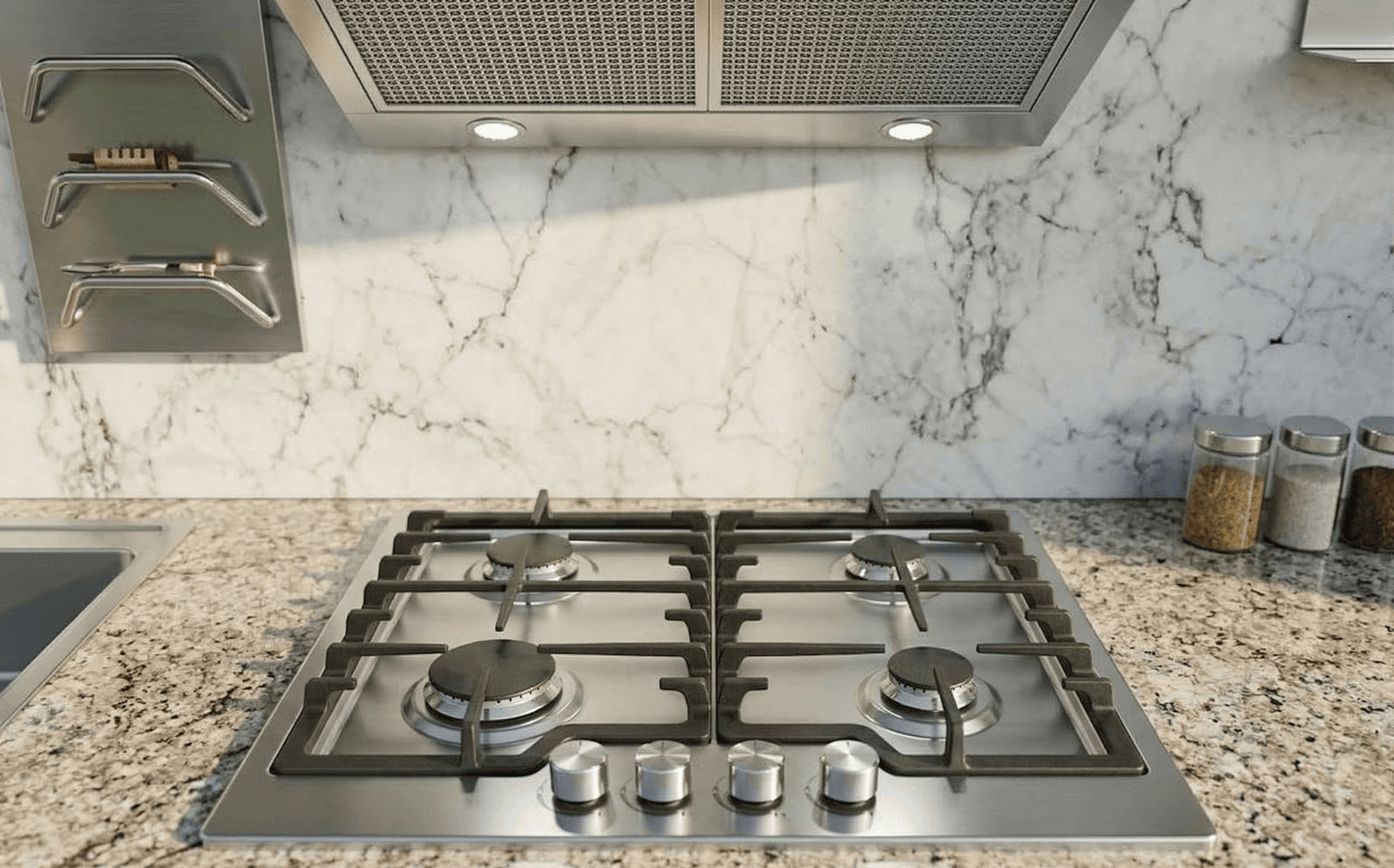 Modern dış mekan bahçe mutfağı tezgahı üzerinde yer alan 4 gözlü paslanmaz çelik ankastre ocak ve mermer görünümlü arka panel.